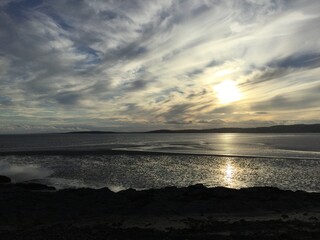 an english beach at sunset