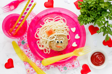 Pasta and meatball shaped girl face - healthy and creative baby brunch or dinner