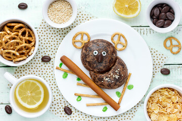 Cookie food art - funny koala from cookies, pretzels and chocolate gingerbread © san_ta