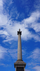 Photo of iconic Nelson's column in Trafalgar square on a spring morning, London, United Kingdom