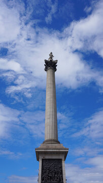 Photo of iconic Nelson's column in Trafalgar square on a spring morning, London, United Kingdom