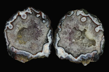 A cross section of the agate stone with quartz geode. Quartz geode surrounded by eyelet agate....