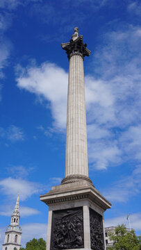 Photo of iconic Nelson's column in Trafalgar square on a spring morning, London, United Kingdom
