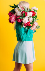 Girl with a bouquet of flowers
