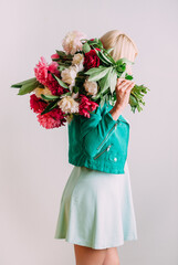 Girl with a bouquet of flowers