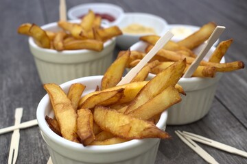 Home fries in bowls for snacks and sauces.