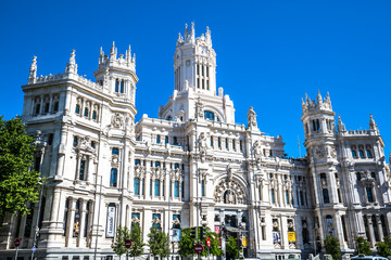 Fototapeta na wymiar Madrid,Spain-May 27,2015: Cibeles Palace and fountain at the Plaza de Cibeles in Madrid, Spain