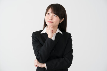 ビジネスウーマン、考える、アイディア、ひらめく