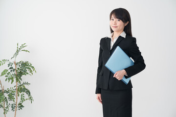 ビジネスウーマン、ファイル、資料