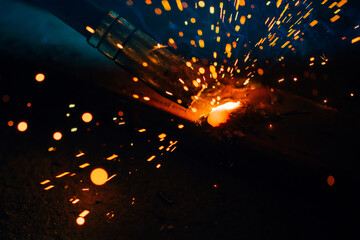 artistic welding sparks light, industrial background