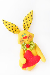 sewing toys handmade rabbit And a red heart Valentines day