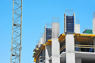 Crane and highrise construction site