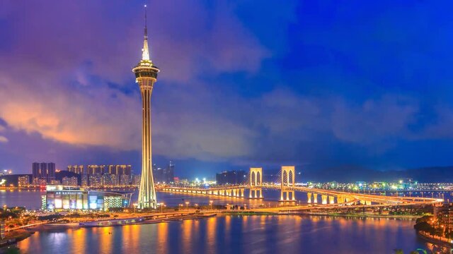 Macau Tower And Macau Bridge Night to Day Time Lapse Of Macau China (zoom in)
