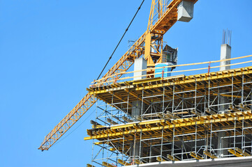 Crane and highrise construction site