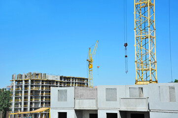 Crane and highrise construction site