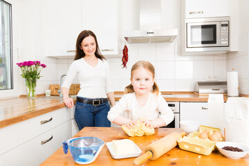 Mother And Daughter Baking Cookies