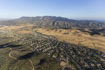 Aerial view of Newbury Park homes and the Santa Monica Mountains National Recreation Area in Ventura County, California.
