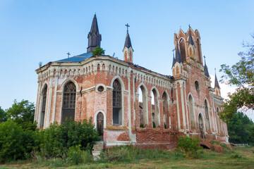 Fototapeta na wymiar Abandoned German temple 19th Century built of red brick in Saratov region, Russia
