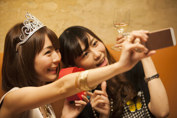 Women are taking self-shots with gifts
