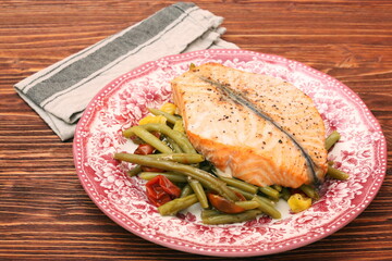 Salmon steak, veggies and herbs