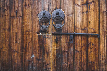 closeup of the antique oriental door knocker,Lishui city,china.