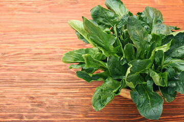 Fresh spinach leaves in bowl