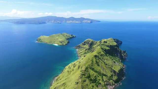 Background Green Island View. Aerial Landscape View of Paradise Tropical Beach from Plane from Above. Aerial Background Video Pattern of Paradise Peaceful Island. Aerial footage, 4K Video Background