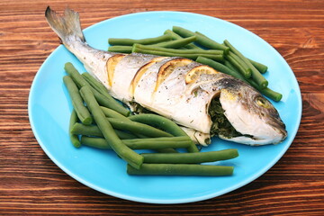 Grilled sea bream fish with green beans