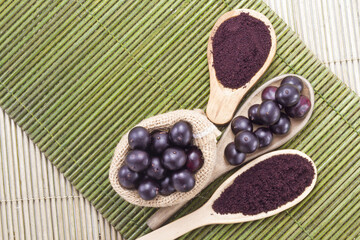 Fruits and acai powder originating from the Amazon  (Euterpe oleracea)