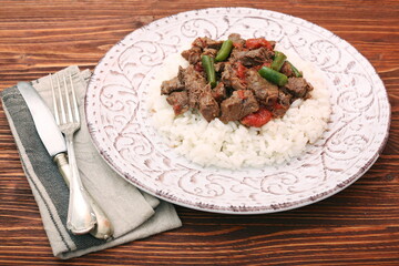 beef stew with white rice and sauce