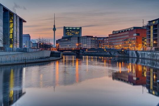 Sunrise at the river Spree in Berlin with the Television Tower in the back