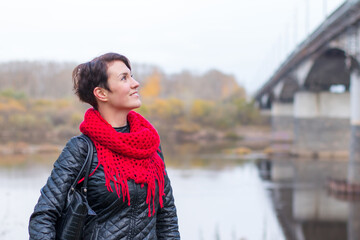 Obraz premium Nice girl in red scarf outdoor
