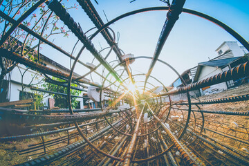 Rolls of wire mesh steel for construction put a pile on the ground