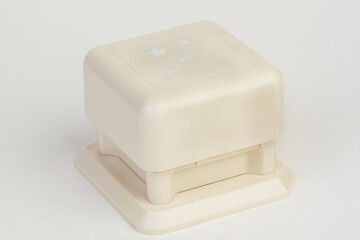 Eyelet punch for paper. Easy to use for scrapbooking and other craft projects.