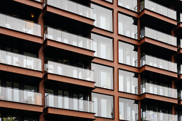 Obraz premium Detail of steel facade with balconies in modern apartment building