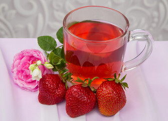 large strawberries with a glass bowl compote rose
