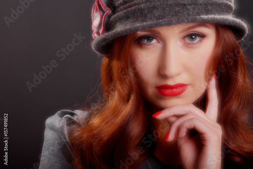 Vintage Style Portrait Of Beautiful Young Woman Wearing A Cloche