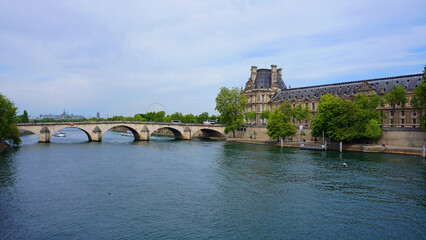 Fototapeta premium Photo of Louvre Palace on a cloudy morning, Paris, France