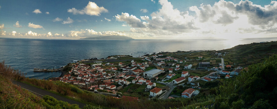 Aerial view to Vila do Corvo and Flores island at sunset in Corvo island, Azores, Portugal