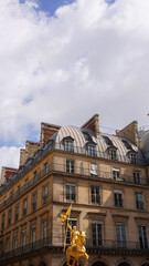 Fototapeta na wymiar Photo of golden statue of Jean d'Arc in Paris, France