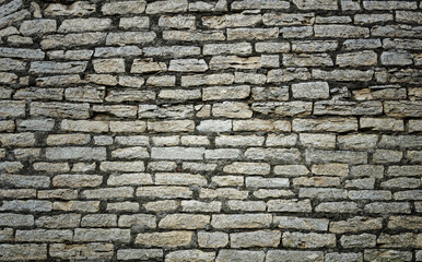 Old gray stone wall background