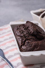 Delicious fresh homemade chocolate banana bread cake in baking form