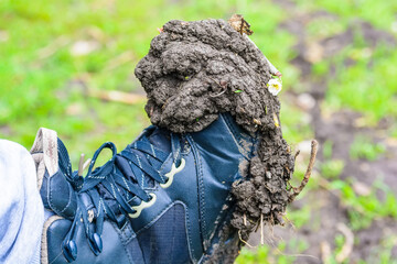 Close up boot with dry mud