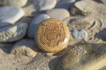 Fototapeta na wymiar Wooden vessel in the sand between the rocks