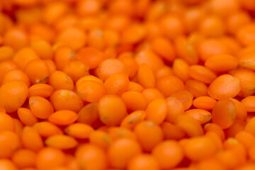 Red lentils as background. macro