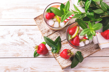 Lemonade with fresh strawberry, mint, lime and jam