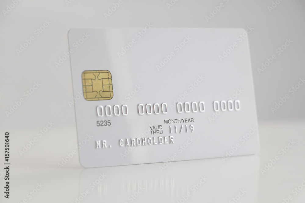 Wall mural White credit card on white background