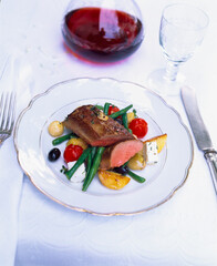 Roasted lamb with feta and vegetables