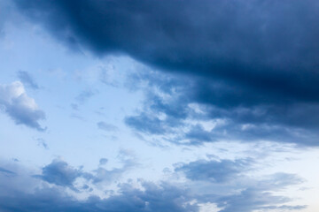 Obraz premium Beautiful clouds at sunset after rain as background .