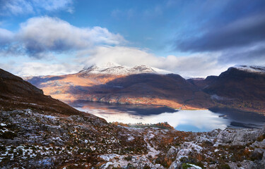 The summits of Slioch and Beinn a Mhuinidh over Loch Maree in the Scottish Highlands, Scotland, UK.